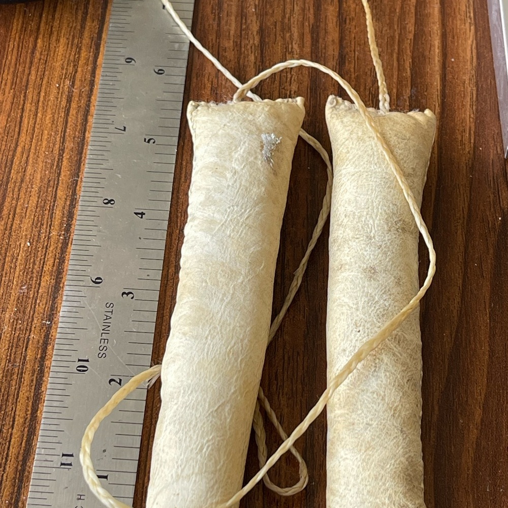 Natural Rawhide object from the north possibly a decorative object or tool